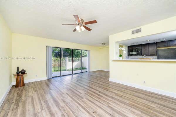 8801 W SAMPLE RD APT 7, CORAL SPRINGS, FL 33065 - Image 1