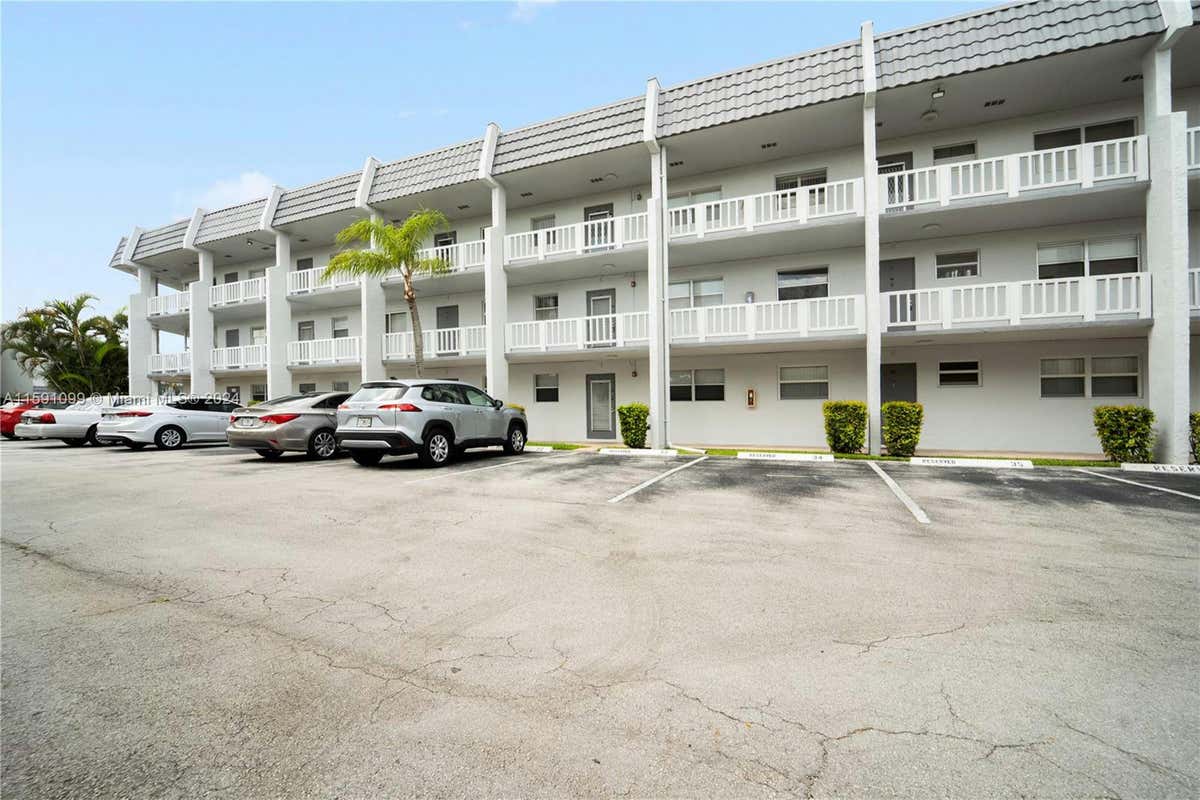 6550 ROYAL PALM BLVD APT 210A, MARGATE, FL 33063, photo 1 of 22