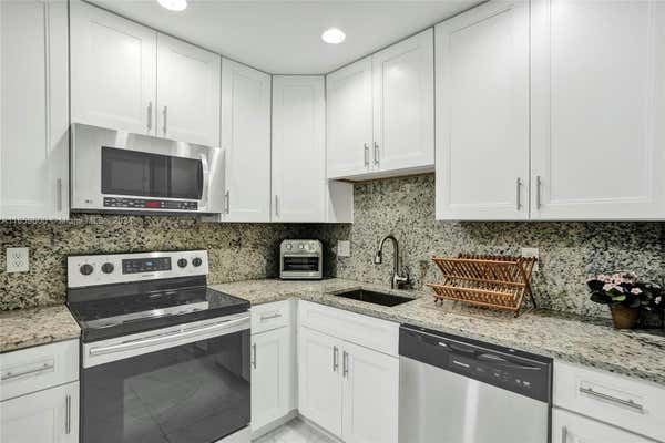 4821 NW 22ND CT APT 111, LAUDERHILL, FL 33313 - Image 1