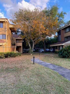 15545 MIAMI LAKEWAY N # 202-21, MIAMI LAKES, FL 33014 - Image 1