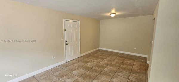 431 EXECUTIVE CENTER DR APT 104, WEST PALM BEACH, FL 33401 - Image 1