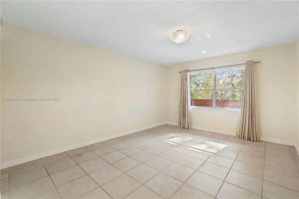 1205 MARIPOSA AVE APT 322, CORAL GABLES, FL 33146, photo 3 of 24