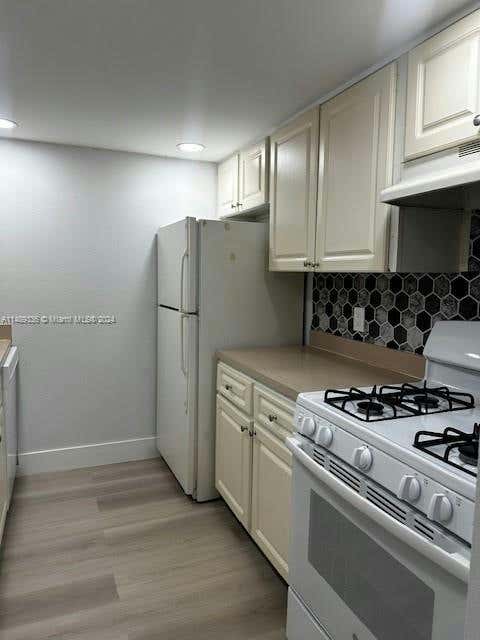 17901 NW 68TH AVE APT T205, HIALEAH, FL 33015, photo 1 of 14