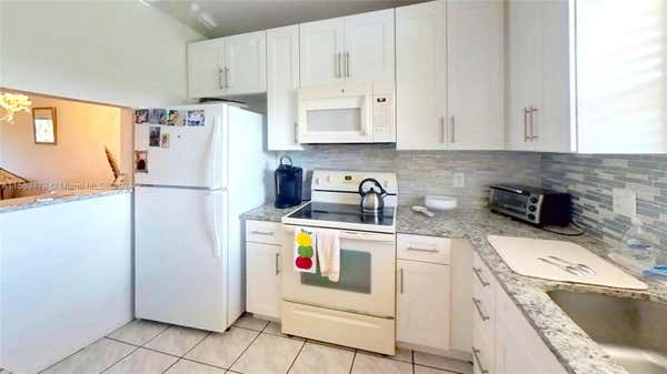 21890 LAKE FOREST CIR APT 201, BOCA RATON, FL 33433, photo 3 of 33