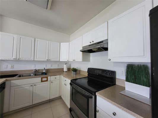 17350 NW 67TH AVE APT 108, HIALEAH, FL 33015, photo 3 of 42