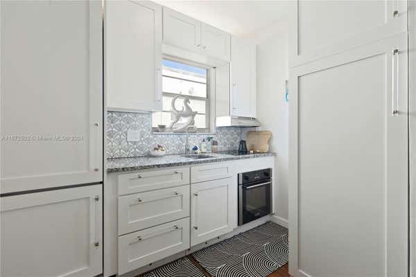 1043 NW 2ND ST APT 13, MIAMI, FL 33128 - Image 1