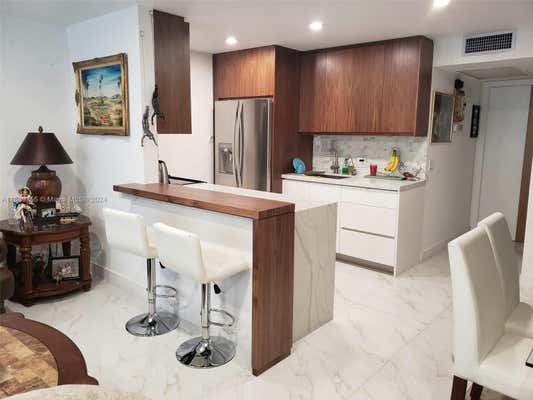 251 SW 132ND WAY APT 104H, PEMBROKE PINES, FL 33027 - Image 1