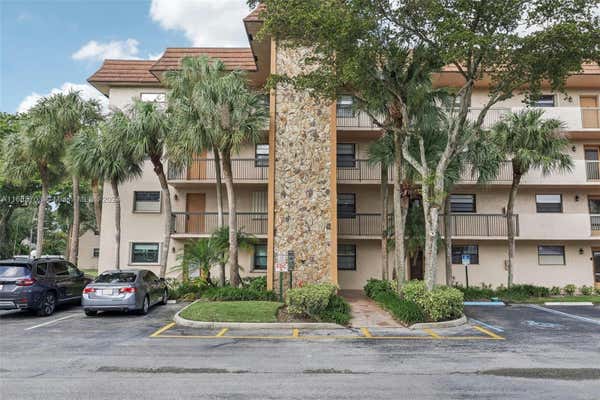 4960 E SABAL PALM BLVD APT 201, TAMARAC, FL 33319 - Image 1