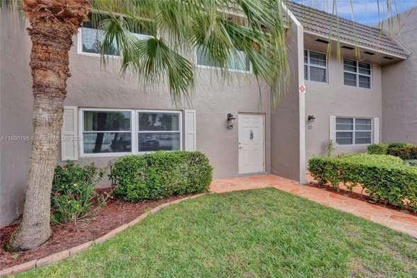 9050 NW 28TH ST APT 104, CORAL SPRINGS, FL 33065 - Image 1