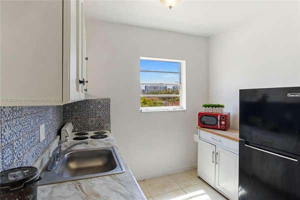 1043 NW 2ND ST APT 16, MIAMI, FL 33128 - Image 1