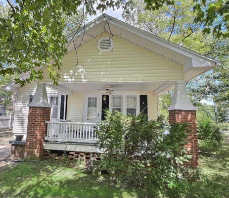 1104 W WALNUT ST, NEVADA, MO 64772 - Image 1