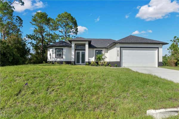 3108 22ND ST SW, LEHIGH ACRES, FL 33976 - Image 1