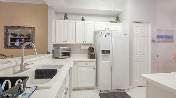 14521 FARRINGTON WAY APT 203, FORT MYERS, FL 33912, photo 5 of 32