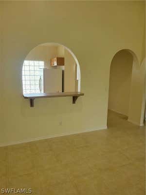 2261 SOMERSET RIDGE DR UNIT 203, LEHIGH ACRES, FL 33973, photo 4 of 28