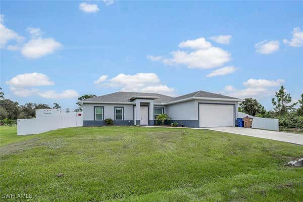 910 RICHMOND AVE N, LEHIGH ACRES, FL 33972 - Image 1