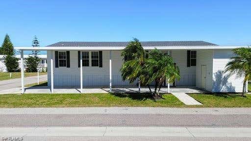 2 HOLLAND DR, PUNTA GORDA, FL 33950, photo 1 of 32