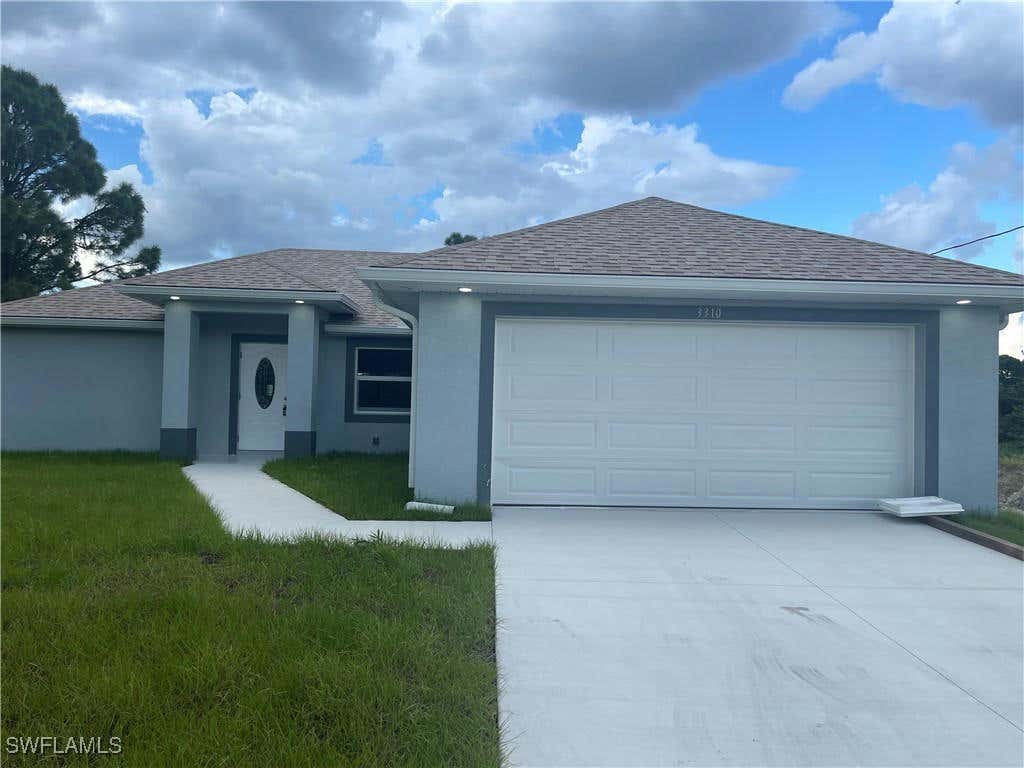 3310 2ND ST SW, LEHIGH ACRES, FL 33976, photo 1 of 31