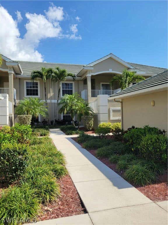 2261 SOMERSET RIDGE DR UNIT 203, LEHIGH ACRES, FL 33973, photo 1 of 28