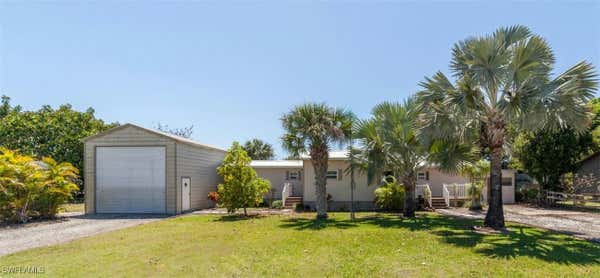 1014 E ANCHOR LN, MOORE HAVEN, FL 33471 - Image 1