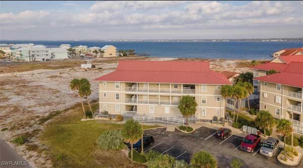 7476 SUNSET HARBOR DR APT 414, NAVARRE, FL 32566 - Image 1