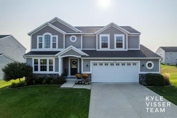 556 HIGHLANDER DR NE, ROCKFORD, MI 49341 - Image 1