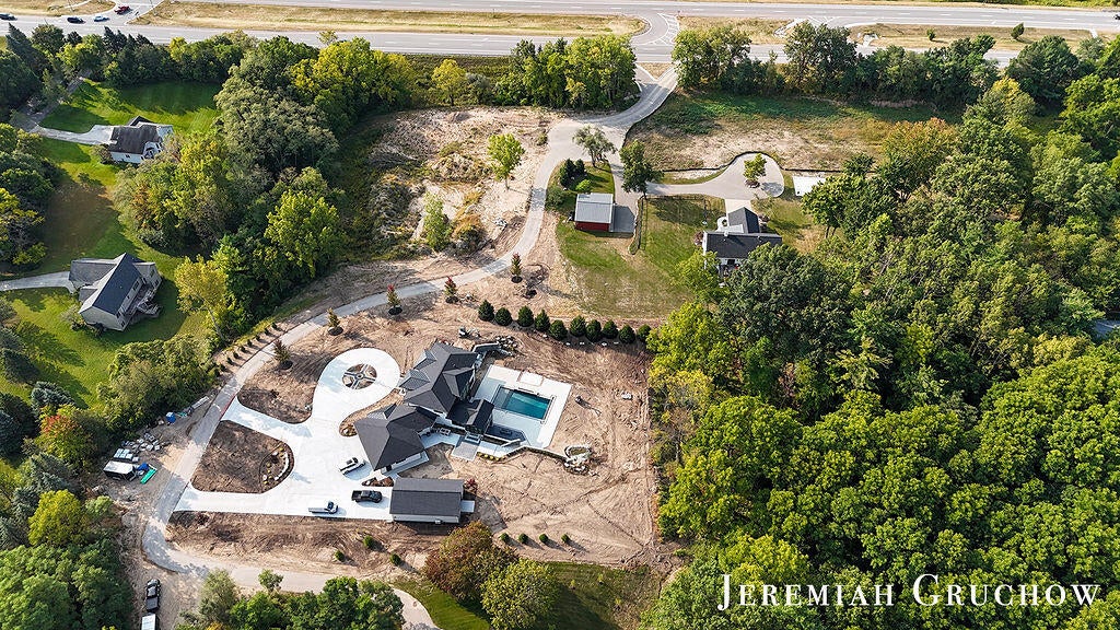 Ada, Michigan, 49301, United States, 4 Bedrooms Bedrooms, ,4 BathroomsBathrooms,Residential,Active,1929693