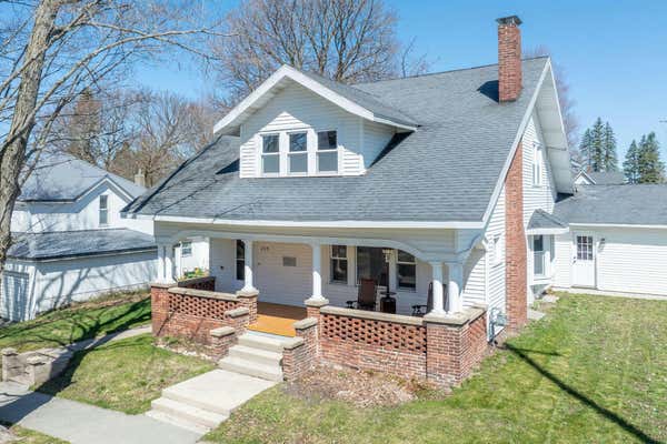 209 E CHURCH ST, TUSTIN, MI 49688 - Image 1