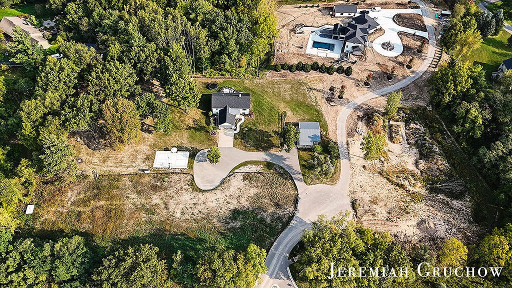 Ada, Michigan, 49301, United States, 4 Bedrooms Bedrooms, ,4 BathroomsBathrooms,Residential,Active,1929693