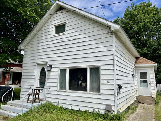 1110 21ST ST, MANISTEE, MI 49660 - Image 1