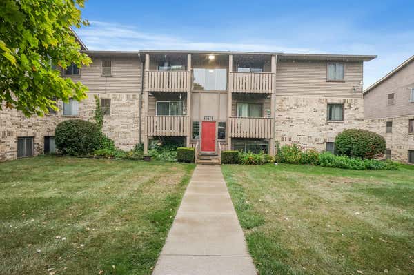 8713 CANDLEWOOD TRL APT 10, BRIGHTON, MI 48116 - Image 1