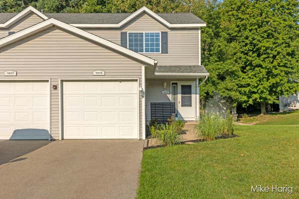 4049 WOODRUSH LN NW, COMSTOCK PARK, MI 49321 - Image 1