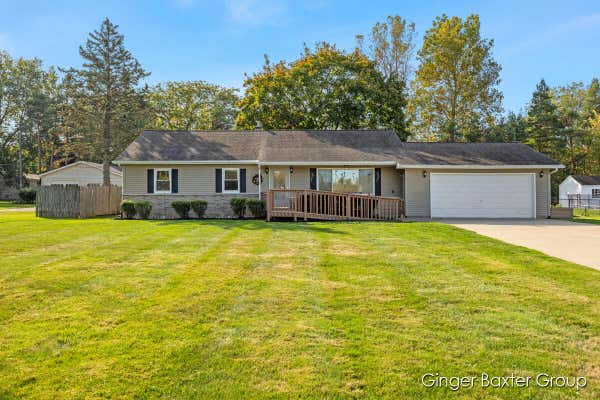 338 CLEVELAND ST W, COOPERSVILLE, MI 49404 - Image 1