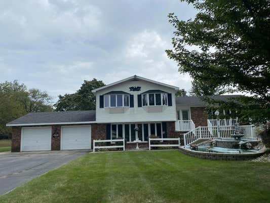 128 S QUARTERLINE RD, SCOTTVILLE, MI 49454, photo 4 of 69