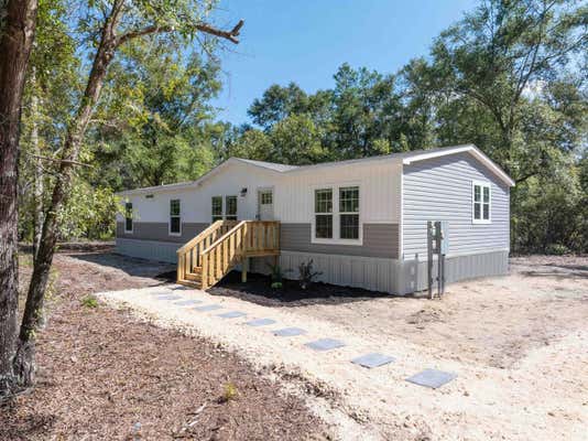 245 NE HILLSIDE TER, LEE, FL 32059 - Image 1