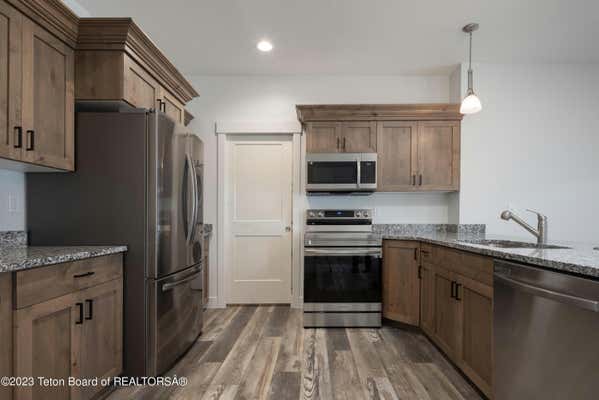 306 SNAKE RIVER DR # 1, ALPINE, WY 83128 - Image 1