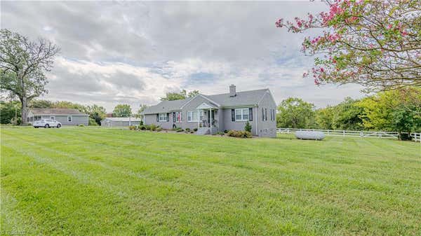 5714 THACKER DAIRY RD, WHITSETT, NC 27377 - Image 1